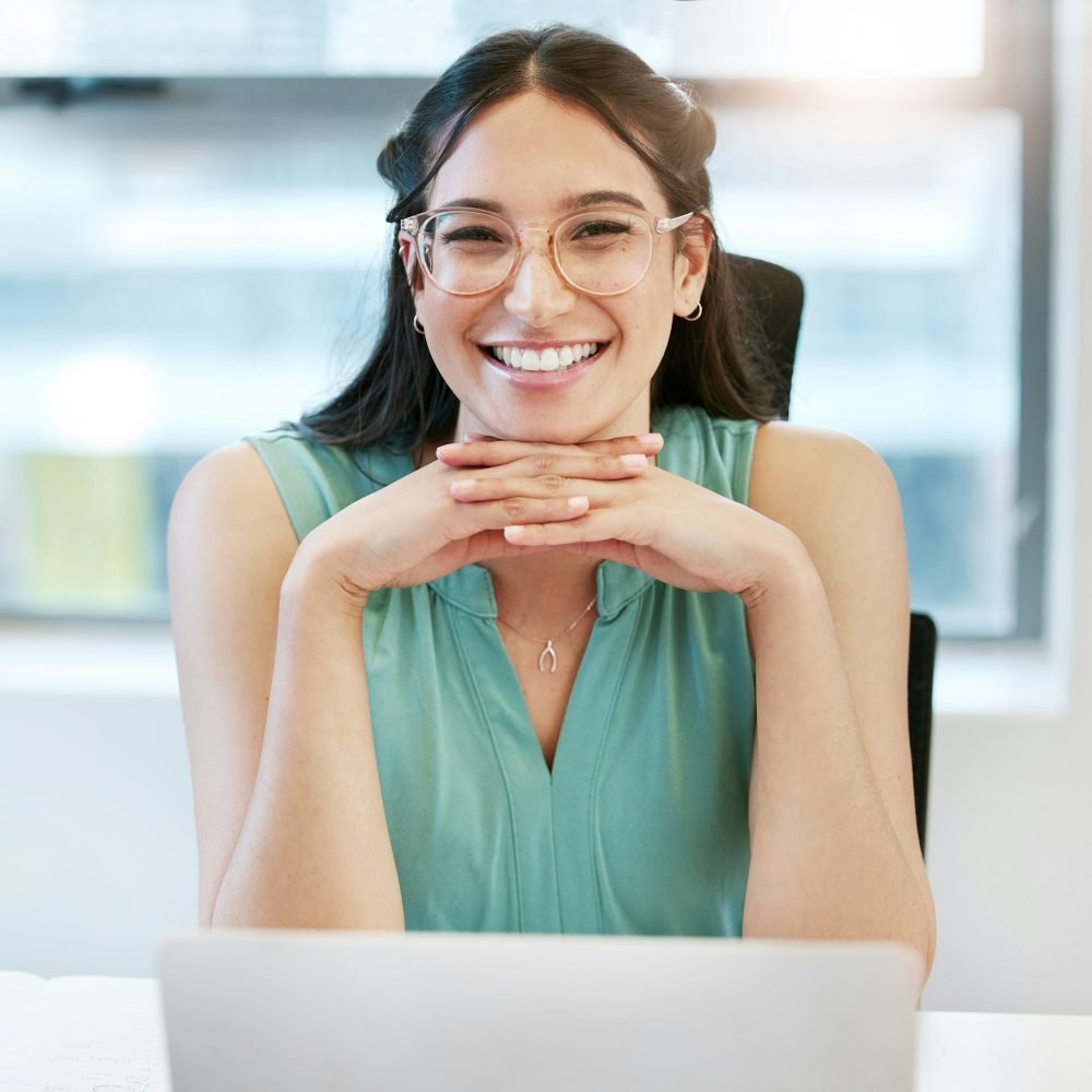portrait-of-a-confident-young-businesswoman-working-in-an-office.jpg