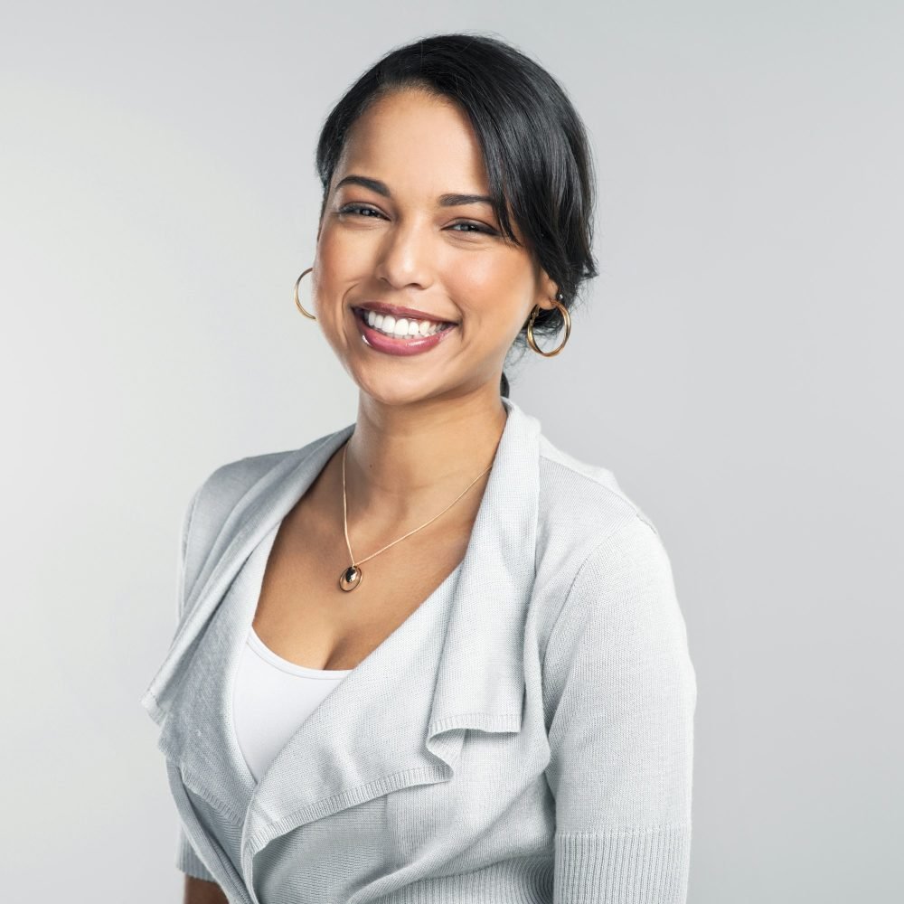 studio-shot-of-a-confident-young-businesswoman-posing-against-a-grey-background.jpg